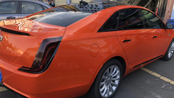 Enveloppe résistante de vinyle de libération d'air de lustre du feu de voiture d'éraflure orange adhésive démontable d'enveloppe